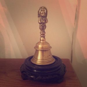 Brass bell with Hindu figurine. Antique. Rare